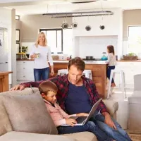 family-sitting-on-couch